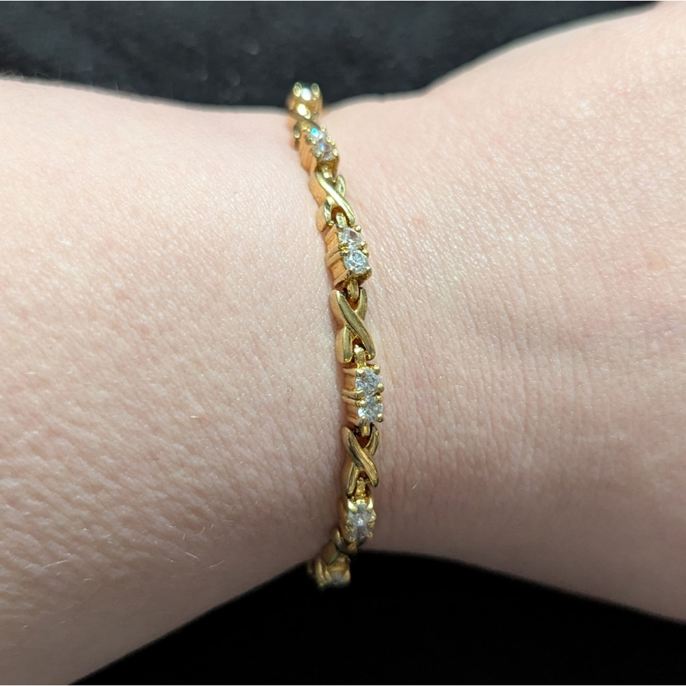 Gold Tone Clear Rhinestone X and O Tennis Style Statement Bracelet